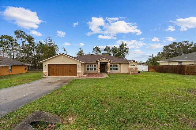 ranch-style house featuring concrete driveway, fence, a garage, stone siding, and a front lawn