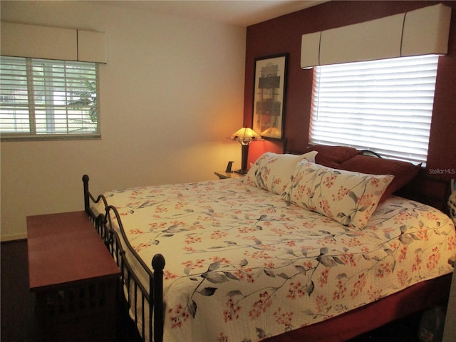 bedroom featuring multiple windows