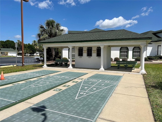 view of property's community with shuffleboard