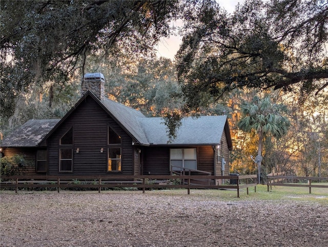 view of log cabin