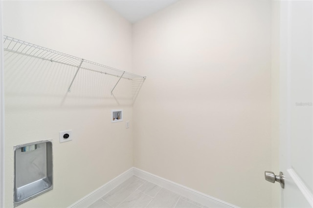 laundry area with light tile patterned flooring, electric dryer hookup, and washer hookup