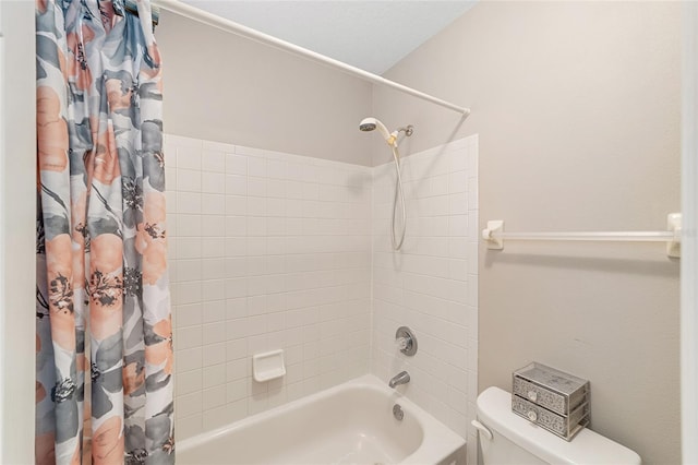 bathroom with shower / bathtub combination with curtain and toilet