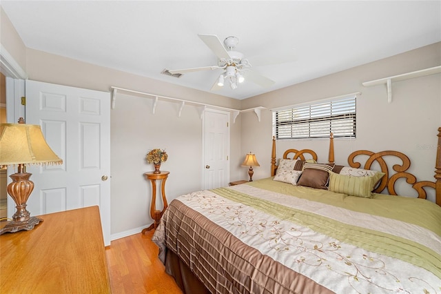 bedroom featuring ceiling fan and light hardwood / wood-style flooring