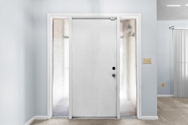 interior space with a textured ceiling