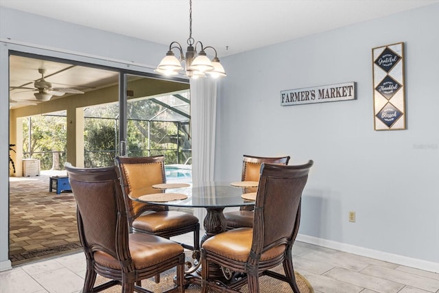 dining space with ceiling fan with notable chandelier