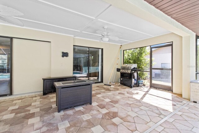 view of patio / terrace featuring grilling area and ceiling fan