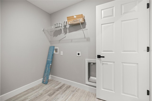 laundry room featuring hookup for a washing machine, hookup for an electric dryer, and light wood-type flooring