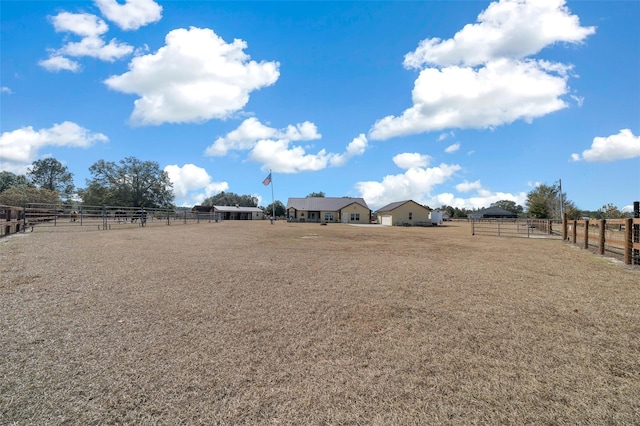 view of yard featuring a rural view