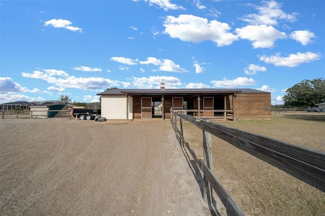 view of front of home with an outbuilding