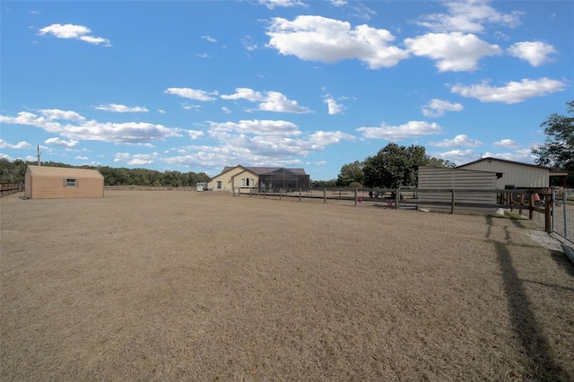 view of yard with an outdoor structure