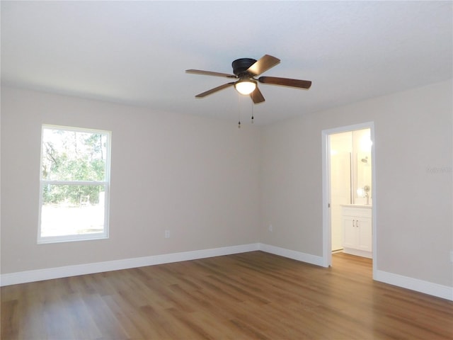14268 SE 27th Ct, Summerfield, FL 34491 - unfurnished room featuring wood finished floors and a ceiling fan