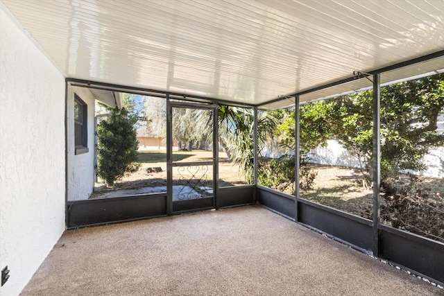 unfurnished sunroom featuring plenty of natural light