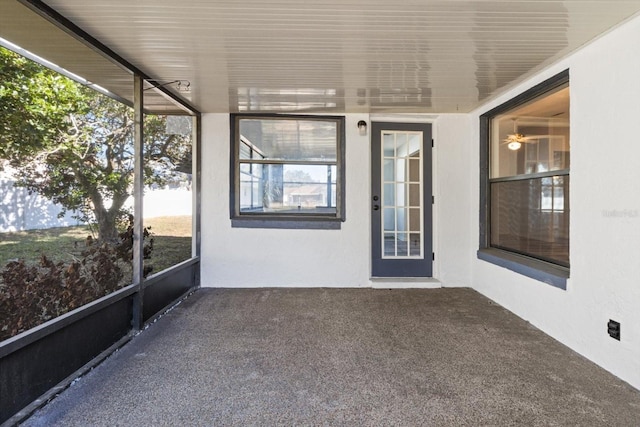 unfurnished sunroom with a wealth of natural light