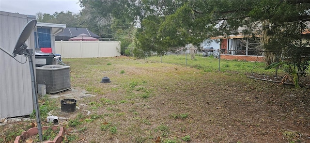 view of yard featuring central AC