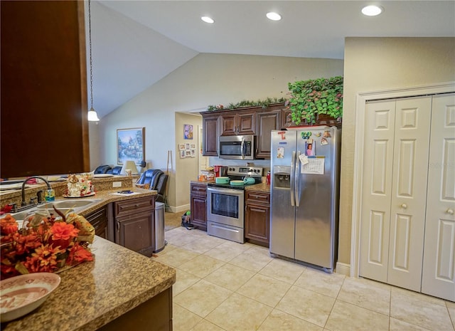 kitchen featuring sink, dark brown cabinets, stainless steel appliances, light tile patterned flooring, and vaulted ceiling