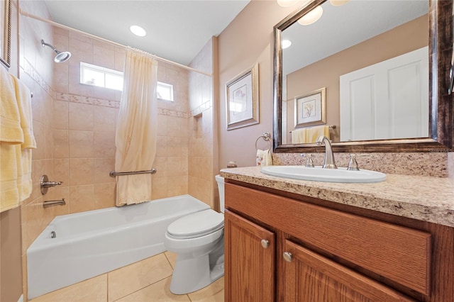 full bathroom with vanity, toilet, tile patterned flooring, and shower / bath combo