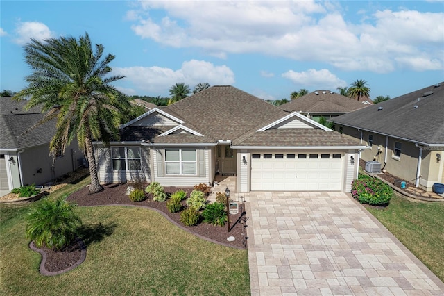 ranch-style house with a garage and a front lawn