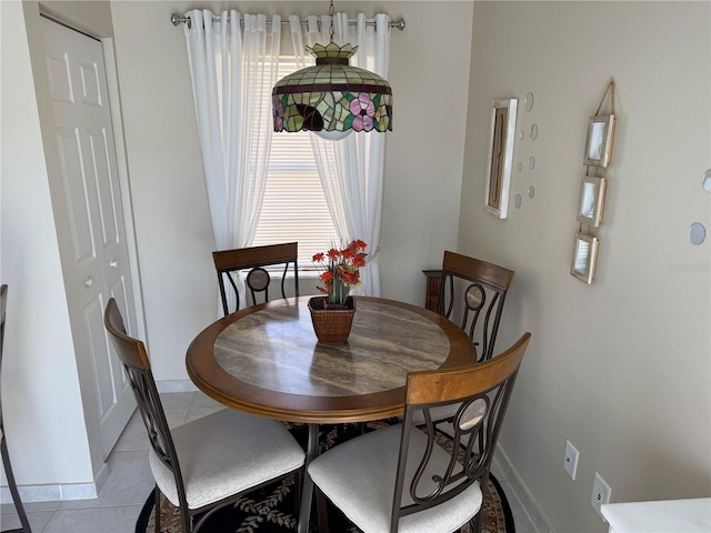 dining room featuring light tile patterned floors