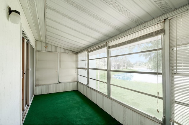 605 Midway Dr Unit B, Ocala, FL 34472 - unfurnished sunroom with lofted ceiling and a water view