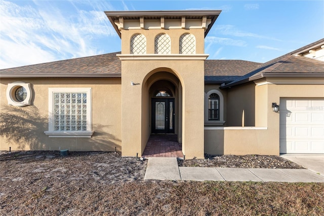 doorway to property featuring a garage