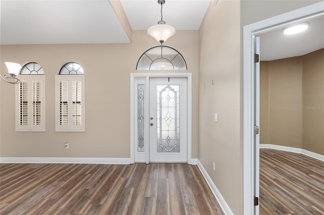 foyer featuring dark wood-type flooring