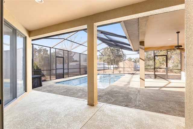 view of pool featuring a lanai and a patio area