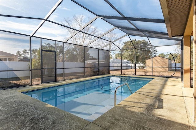 view of pool featuring a lanai and a patio area