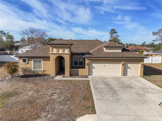 view of front of house with a garage