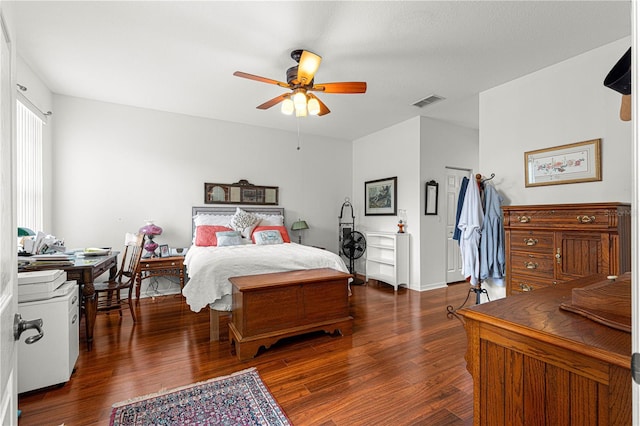 bedroom featuring dark hardwood / wood-style floors and ceiling fan