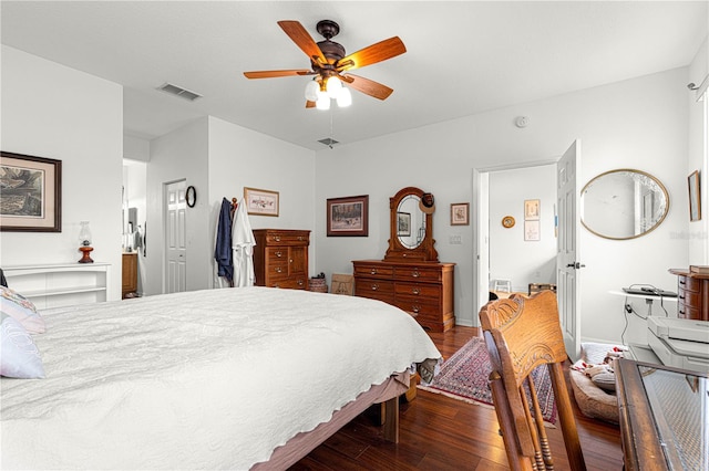 bedroom with dark wood-type flooring and ceiling fan