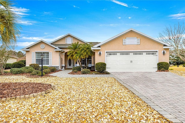 single story home with a garage