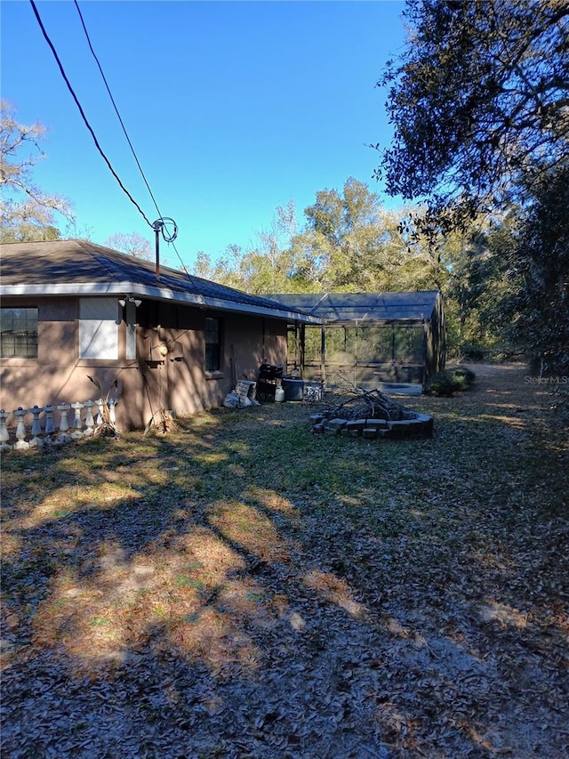 exterior space with a lawn