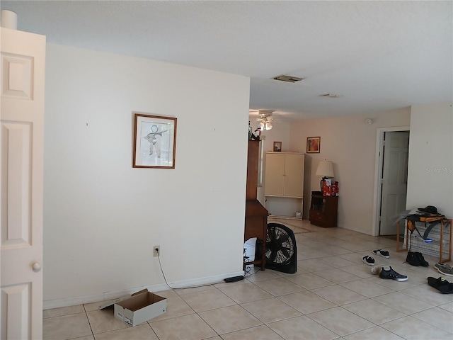 interior space with light tile patterned floors