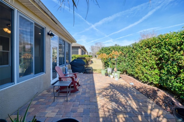 view of patio with a grill