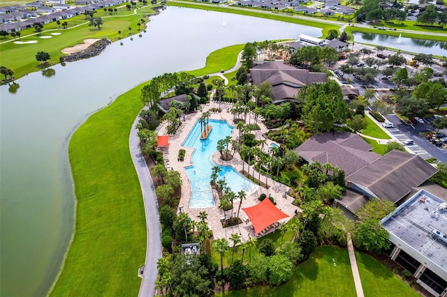 bird's eye view with a water view