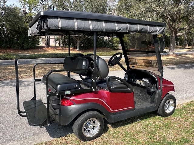 view of parking / parking lot featuring a detached carport