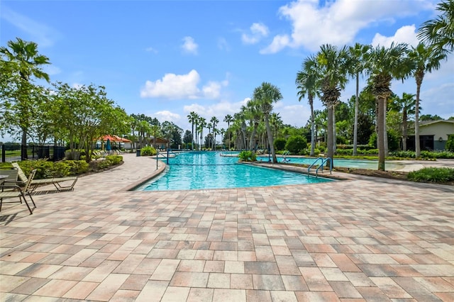 pool with a patio