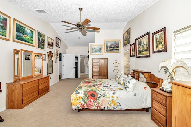 carpeted bedroom with lofted ceiling, a textured ceiling, and ceiling fan