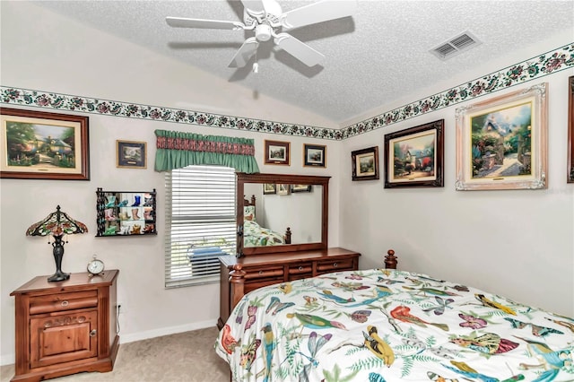 carpeted bedroom with lofted ceiling, a textured ceiling, and ceiling fan