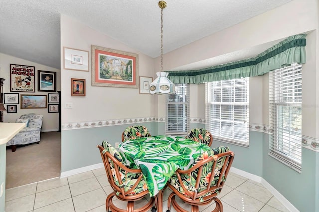 3923 Manor Oaks Ct, Leesburg, FL 34748 - dining area featuring lofted ceiling, plenty of natural light, a textured ceiling, light tile patterned floors, and light carpet