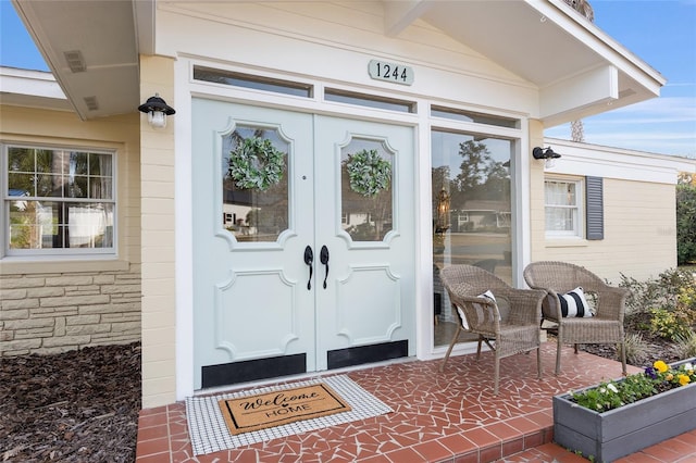 entrance to property featuring french doors