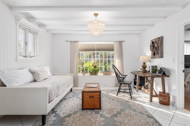 interior space with beam ceiling and a chandelier