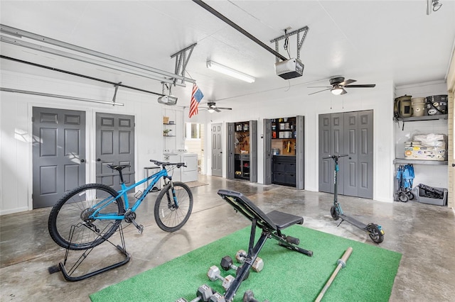 garage with washer / clothes dryer, a garage door opener, and ceiling fan