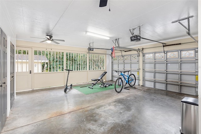 garage featuring a garage door opener and ceiling fan