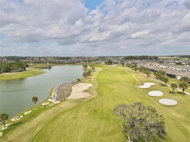 surrounding community with a water view