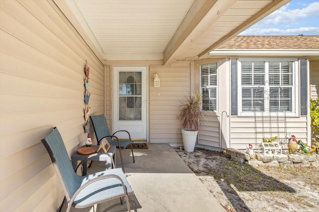 entrance to property with a patio area