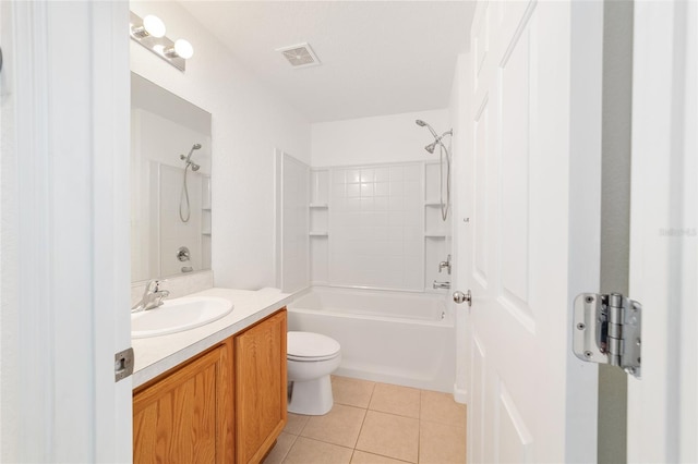 full bathroom featuring tile patterned flooring, vanity, bathing tub / shower combination, and toilet