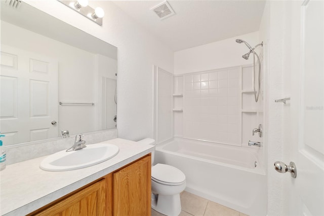 full bathroom featuring vanity, tile patterned floors, toilet, and bathtub / shower combination