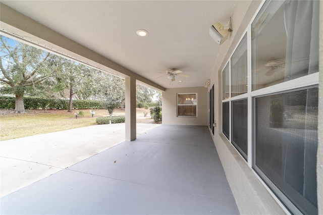 view of patio / terrace featuring ceiling fan