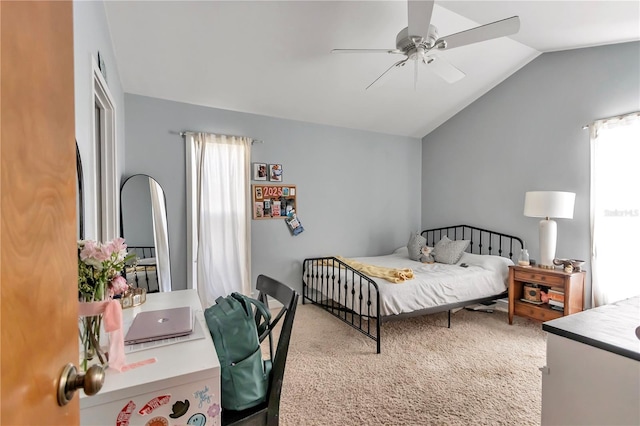 bedroom with multiple windows, lofted ceiling, carpet floors, and ceiling fan